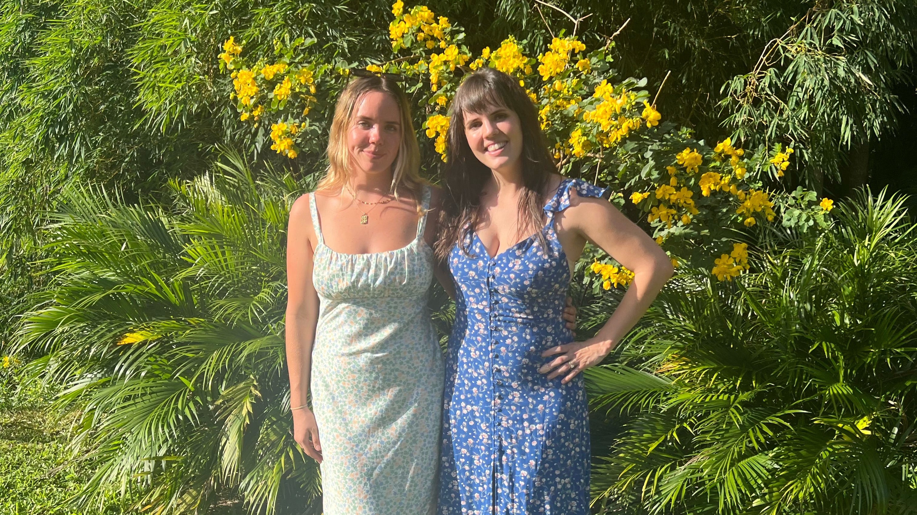 Close picture of Wildkinn founders Katie and Tayla in their flower dresses. 